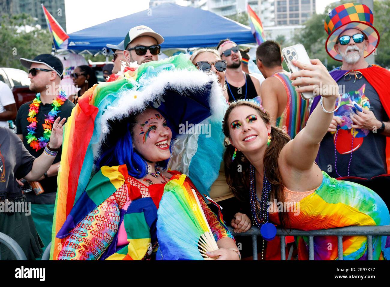 Parade participants interact with people in the crowd during the St