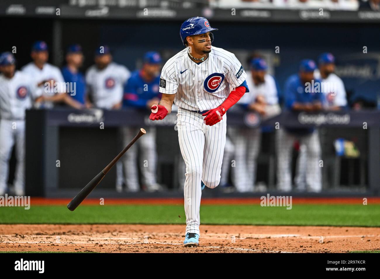 Christopher Morel 5 of the Chicago Cubs runs to first base after