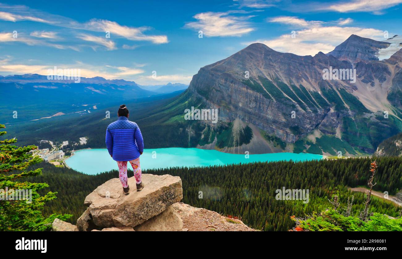 Banff, Canada, August 28th 2022 A Tourist poses for a photo on the