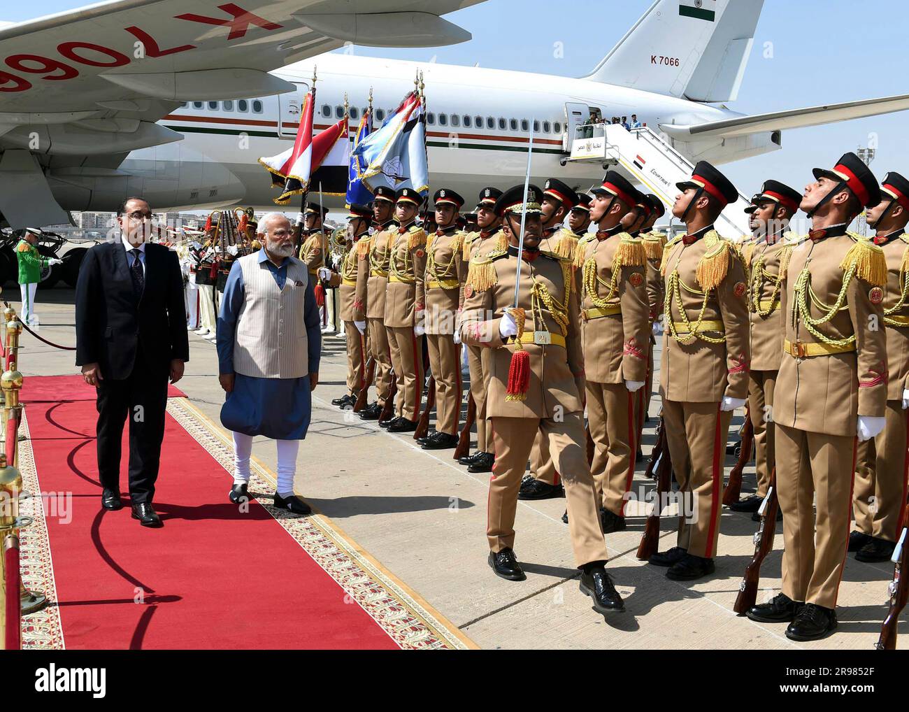 Egypt's Prime Minister Mostafa Madbouly left, and his Indian 