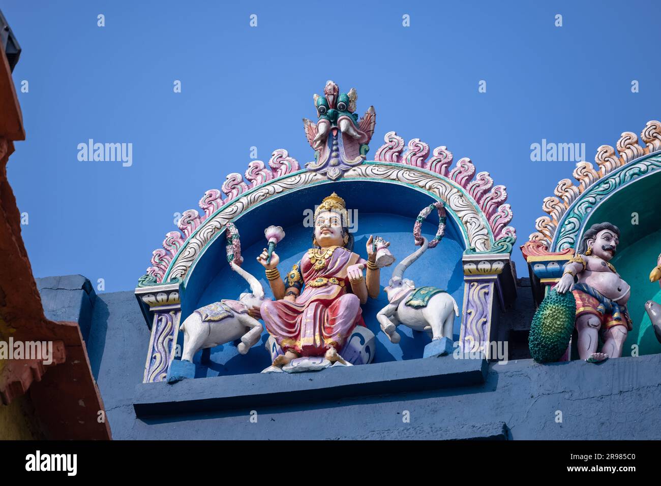 Architecture view of kedar temple with hindu god statues made with colors on top of it. Kedar