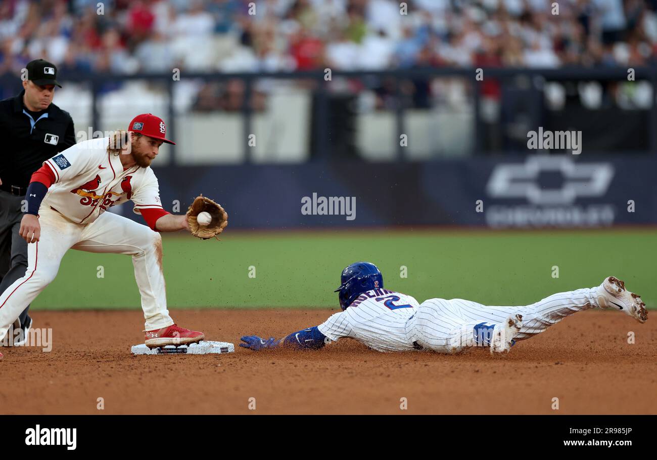 London, UK. 24th June, 2023. Nico Hoerner (R) of Chicago Cubs slides in
