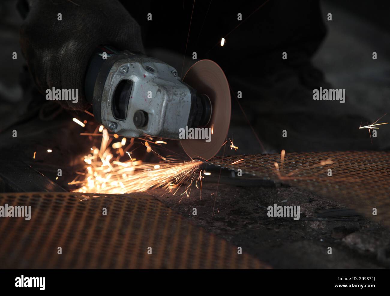 Jakarta, Indonesia June 20, 2023 Cut the iron plate using a grinder
