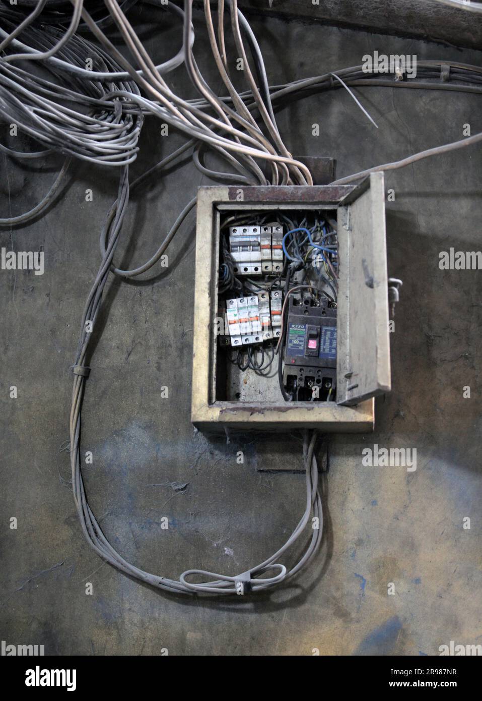 Dangerous mcb cable connection. messy power cable connections. Stock Photo