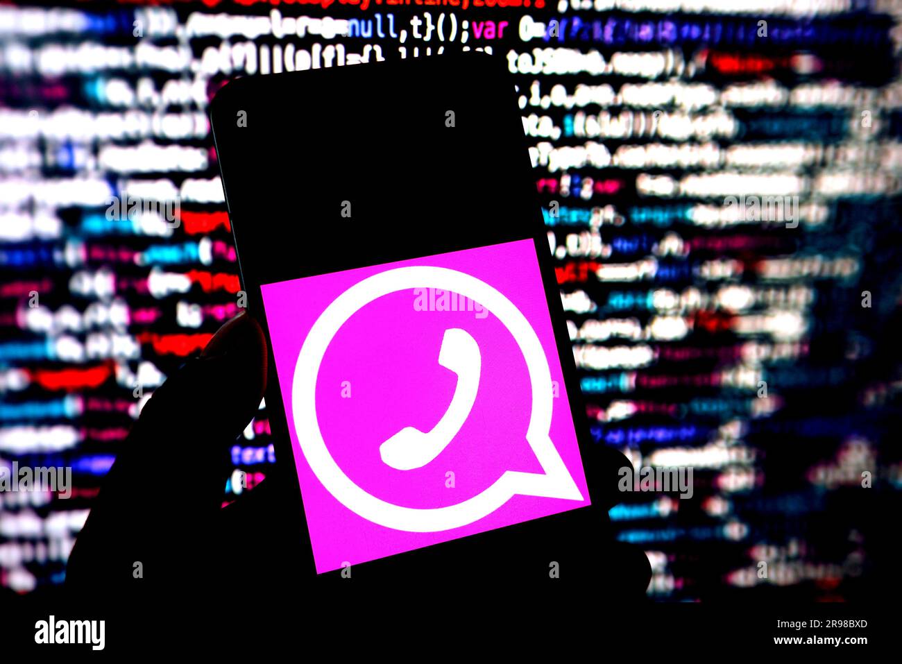 India. 24th June, 2023. In this photo illustration, a Pink Whatsapp logo is seen displayed on a smartphone. Credit: SOPA Images Limited/Alamy Live News Stock Photo