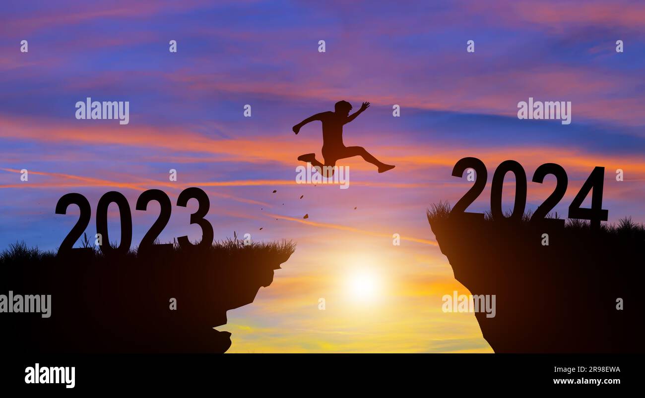 merry Christmas and Happy new year in 2024. Man jumping across