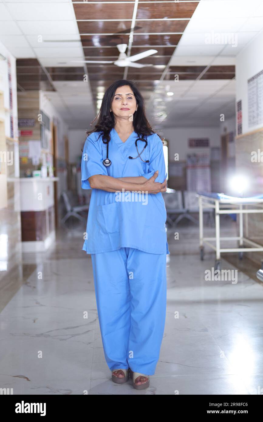 Female in blue uniform hi-res stock photography and images - Alamy