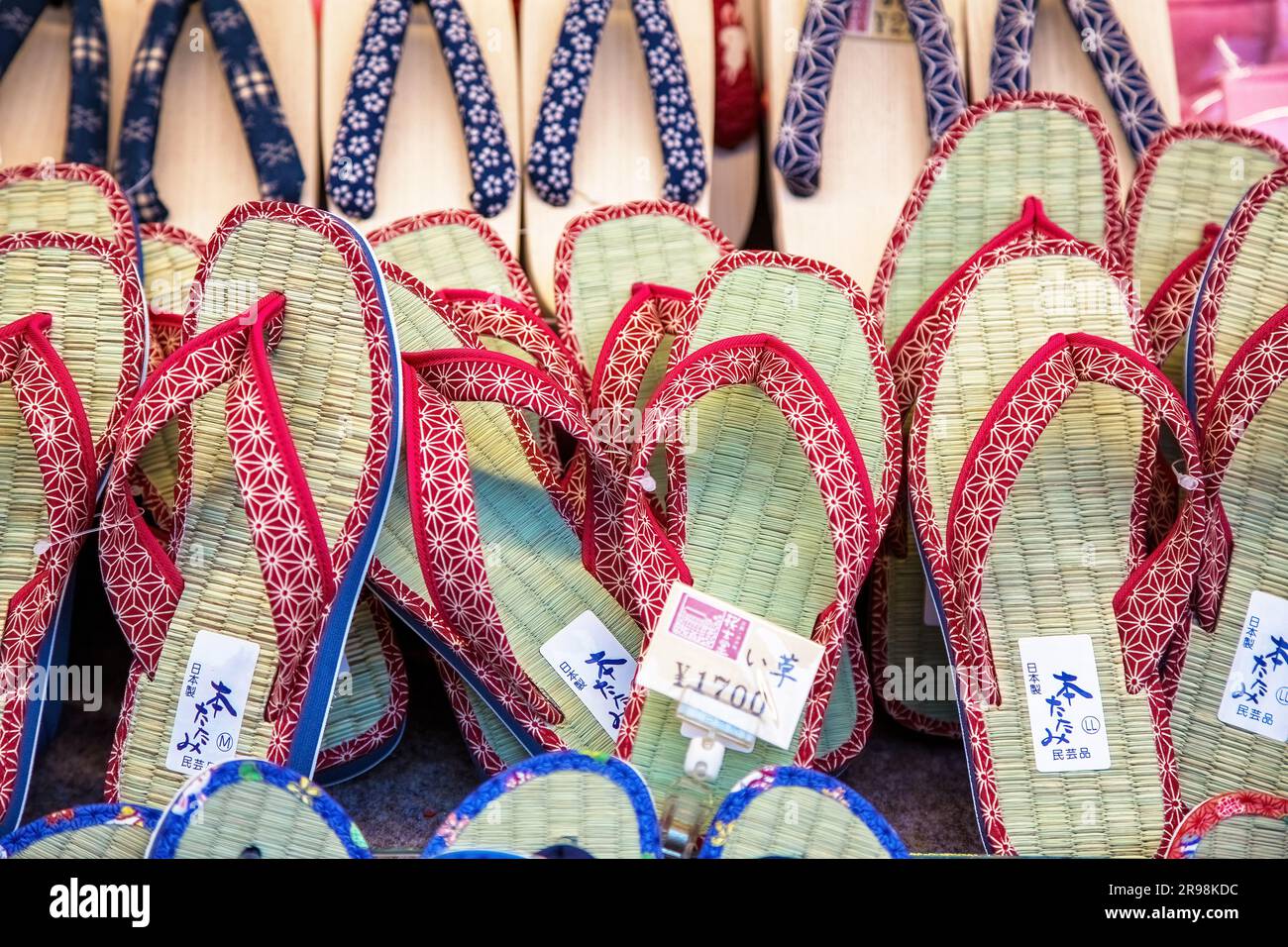 Kyoto, Japan - 15 June 2016. A display of traditional Japanese tatami igusa slippers for sale in a souvenir shop. These are sandals resembling flip-fl Stock Photo