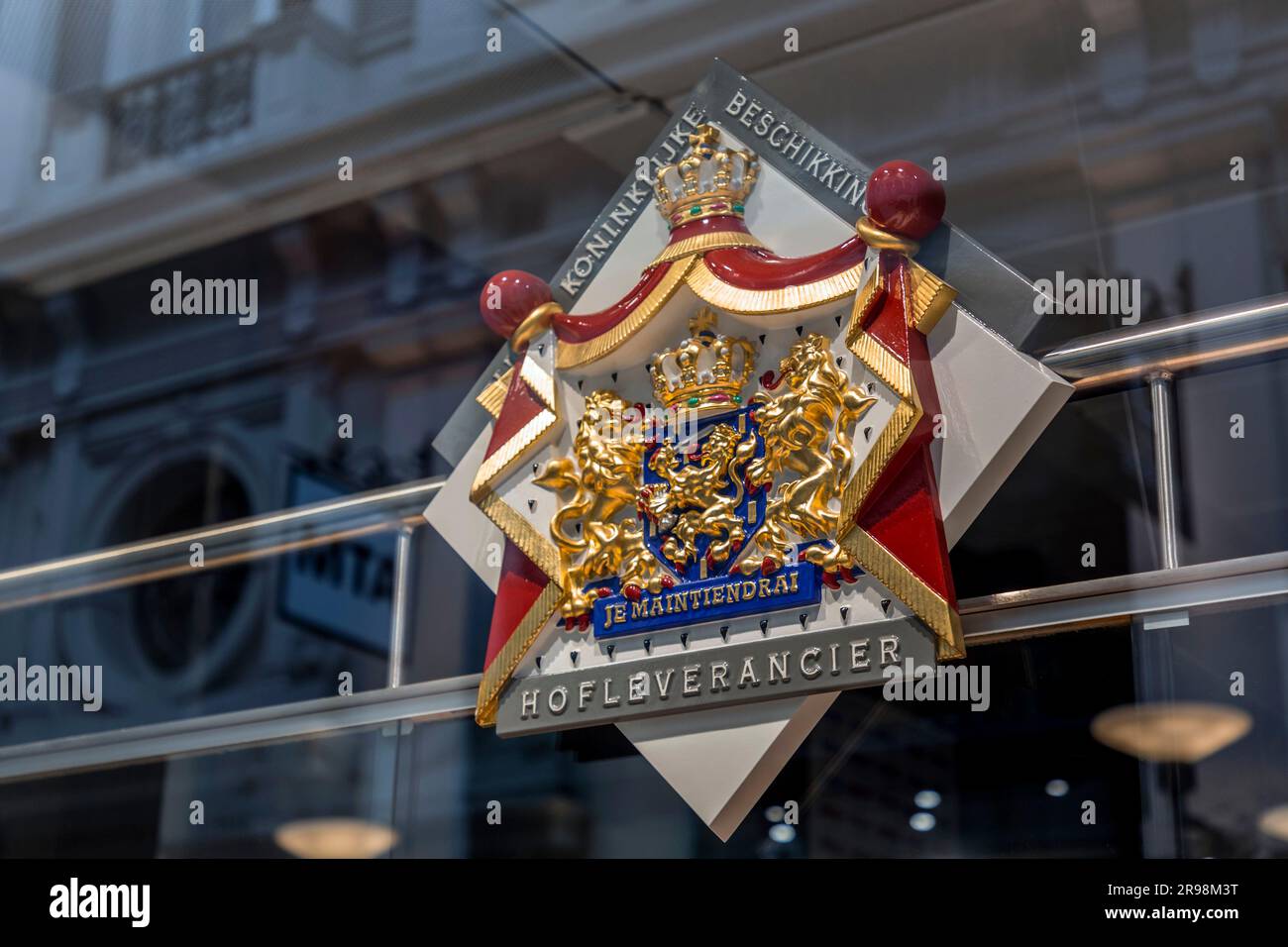 The Hague, Netherlands - October 7, 2021: The royal coat of arms of the Netherlands on a glass wall in The Hague, the roayl seat of government of the Stock Photo
