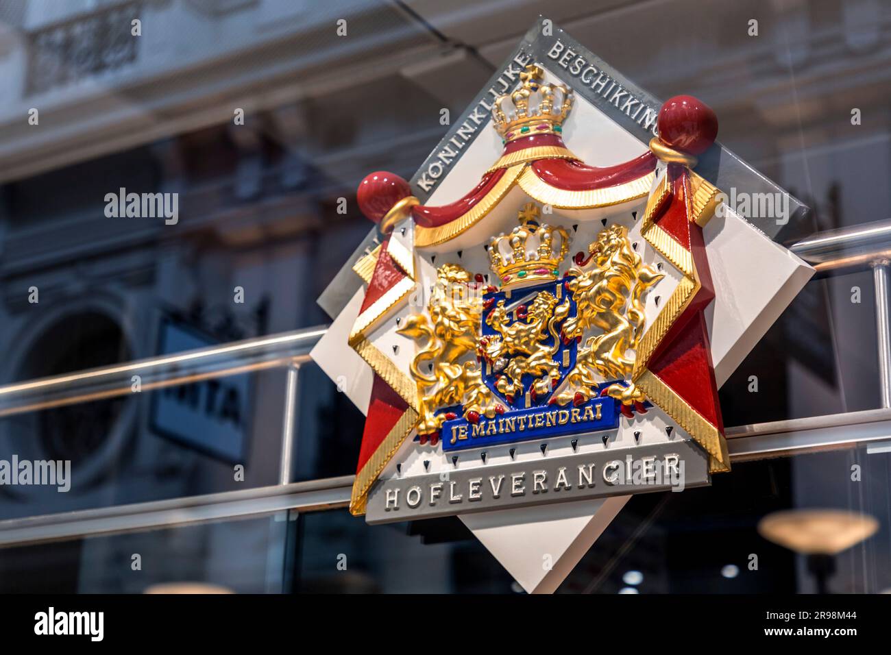 The Hague, Netherlands - October 7, 2021: The royal coat of arms of the Netherlands on a glass wall in The Hague, the roayl seat of government of the Stock Photo