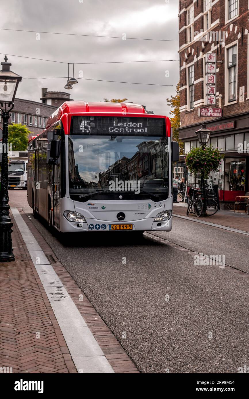 Leiden, Netherlands - October 7, 2021: Public bus in Leiden, North Holland province of the Netherlands. Stock Photo