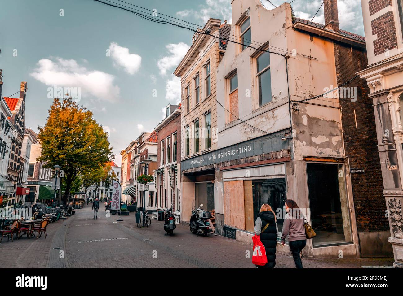 Schiedam, NL - OCT 8, 2021: Typical Dutch architecture and street view in Schiedam, the Netherlands. Stock Photo