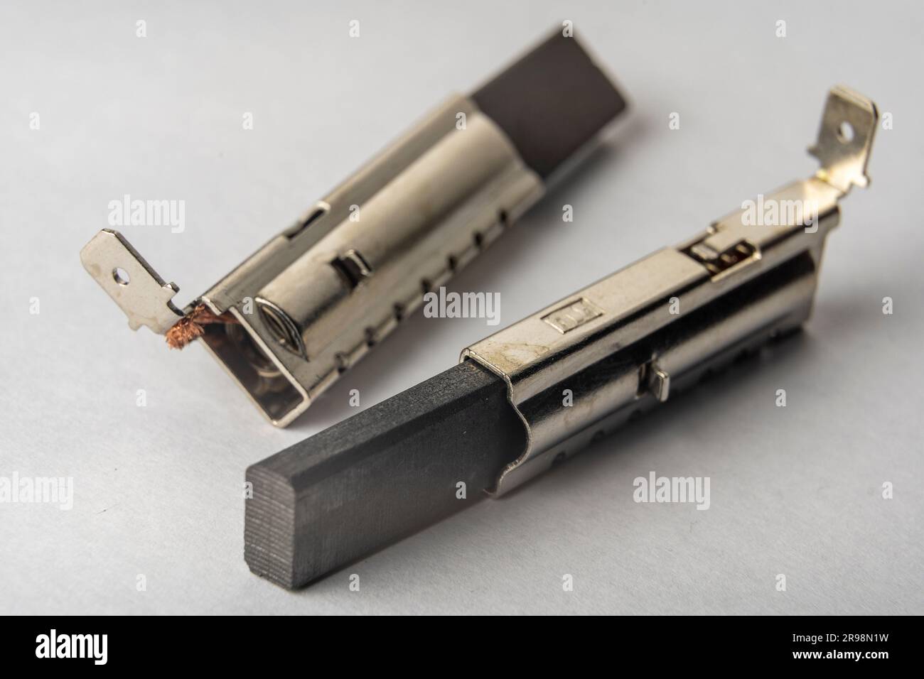 Close up of new electric brushes for replacement in the electric motor