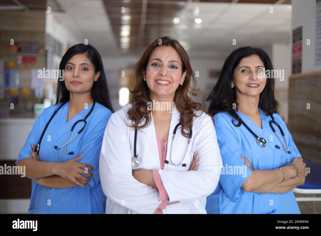 Portrait of Happy Indian Medical Team Standing In Hospital Corridor ...