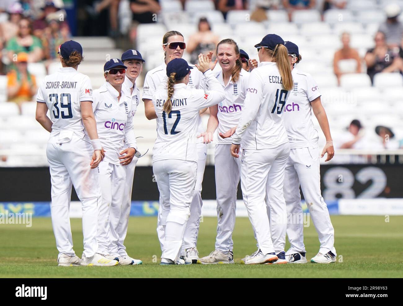 England's Lauren Filer (third right, facing) celebrates taking the
