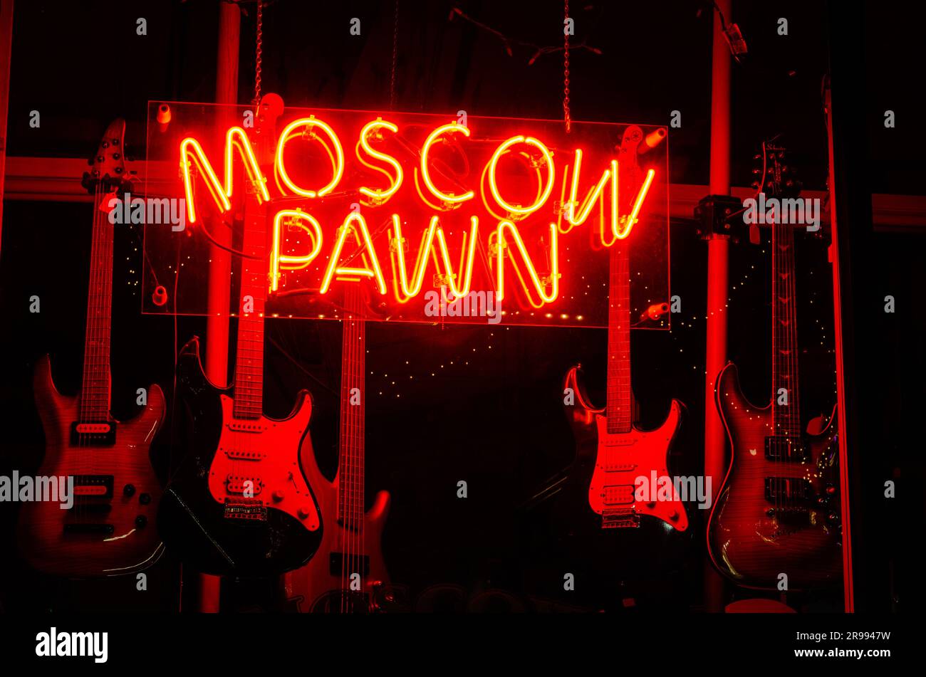 'Moscow Pawn' sign and electric guitars, Moscow, Idaho. Stock Photo