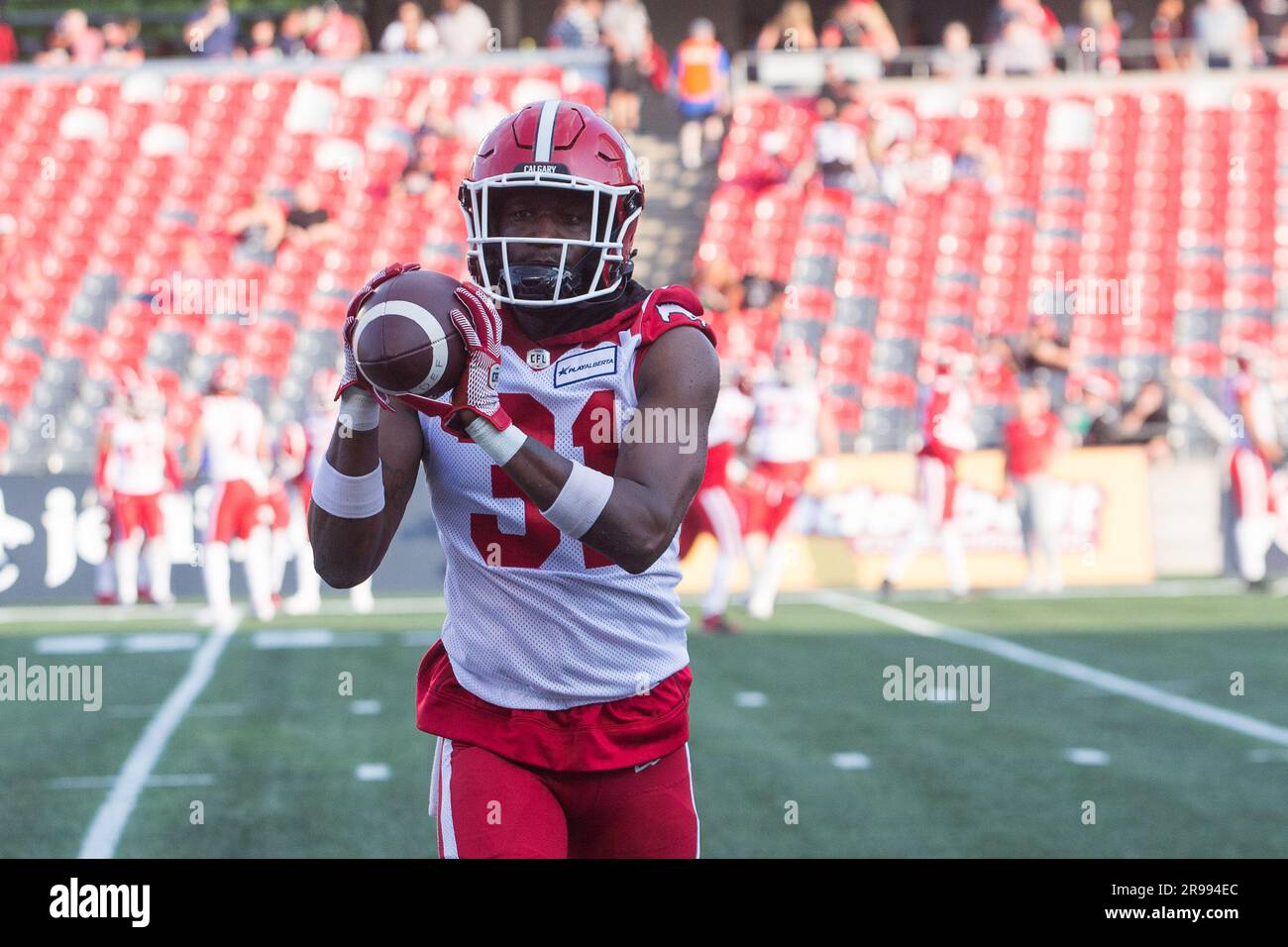 Ottawa, Canada. 15th June, 2023. Calgary Stampeders defensive back Tre Roberson (31) warms up prior to the CFL game between Calgary Stampeders and Ottawa Redblacks held at TD Place Stadium in Ottawa, Canada. Daniel Lea/CSM/Alamy Live News Stock Photo