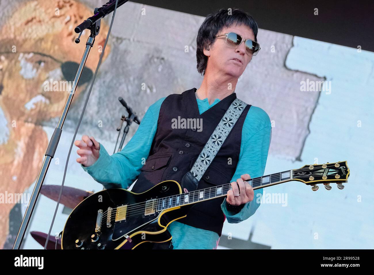 Pilton, UK. 24th June, 2023. Guitarist Johnny Marr, formerly of The Smiths performing live on stage with English-American rock band The Pretenders at Glastonbury Festival of the Performing Arts. Credit: SOPA Images Limited/Alamy Live News Stock Photo