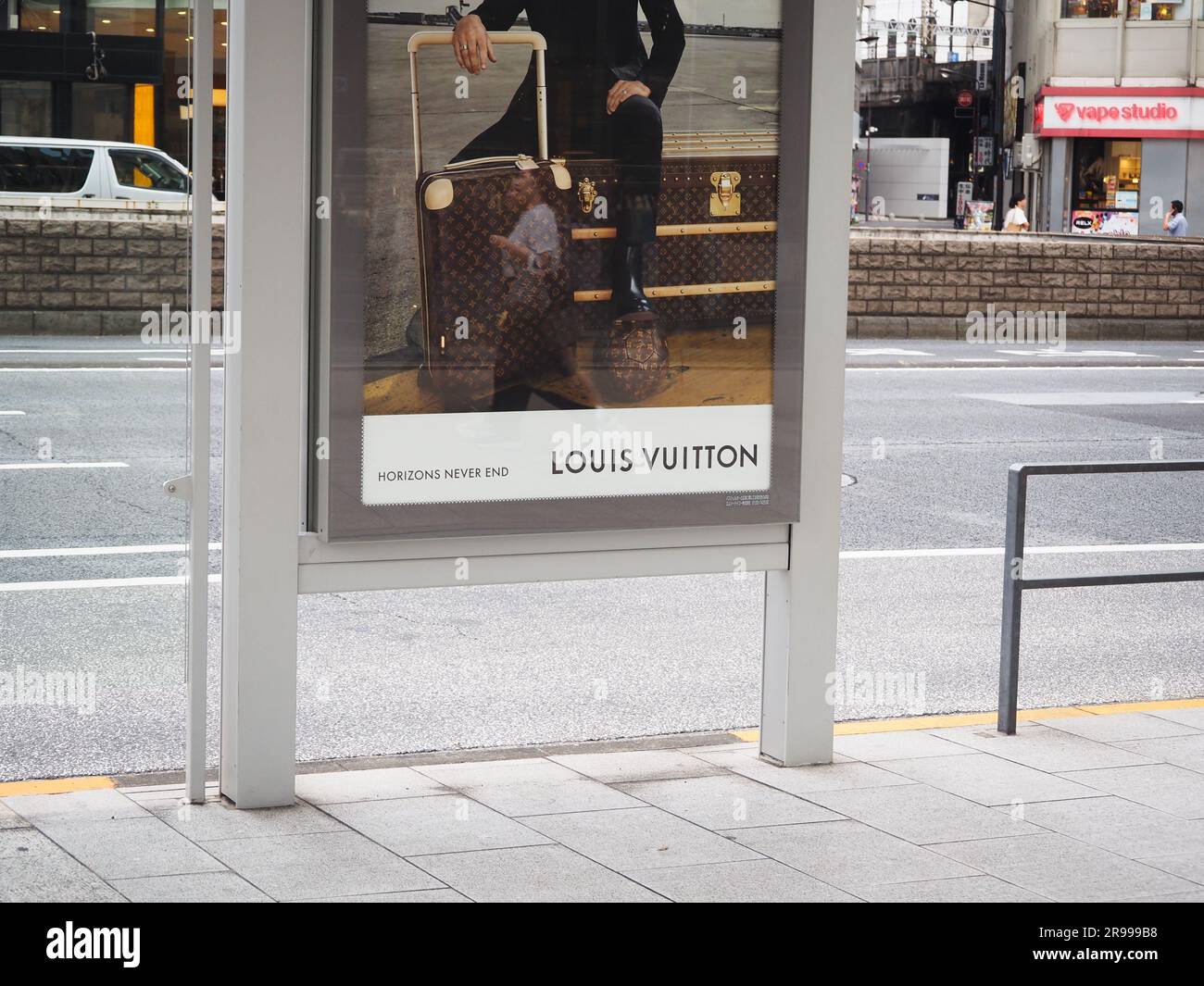 TOKYO, JAPAN - June 13, 2023: Detail of an Louis Vuitton advert, which  features luggage and a football, on a bus shelter in Tokyo's Ginza area  Stock Photo - Alamy