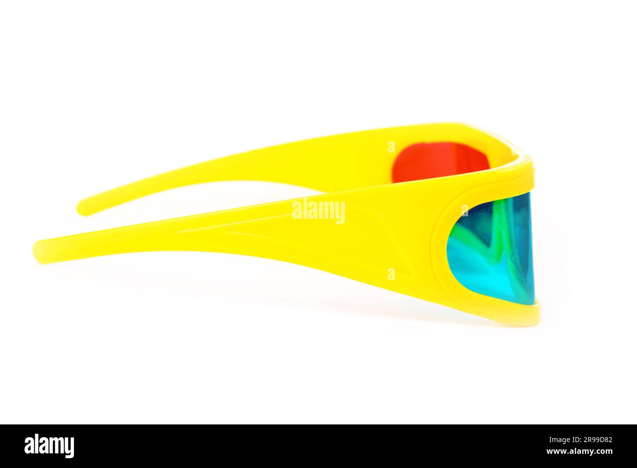 yellow 3d plastic glasses with colored glasses isolated on white Stock