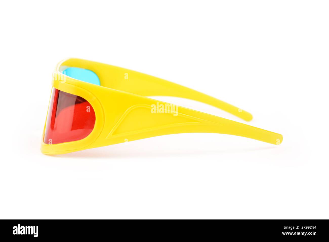 yellow 3d plastic glasses with colored glasses isolated on white Stock