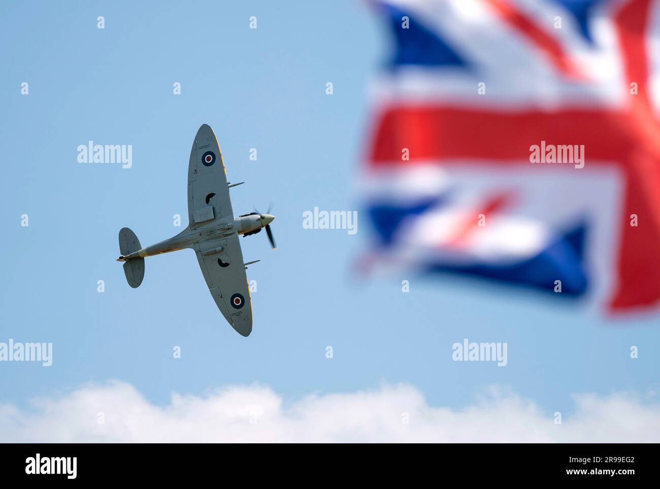 A Supermarine Spitfire displays during the annual Duxford Summer Air Show at IWM Duxford in Cambridgeshire. This year marks the 50th anniversary of the first air show at Duxford. Picture date: Sunday June 25, 2023. Stock Photo