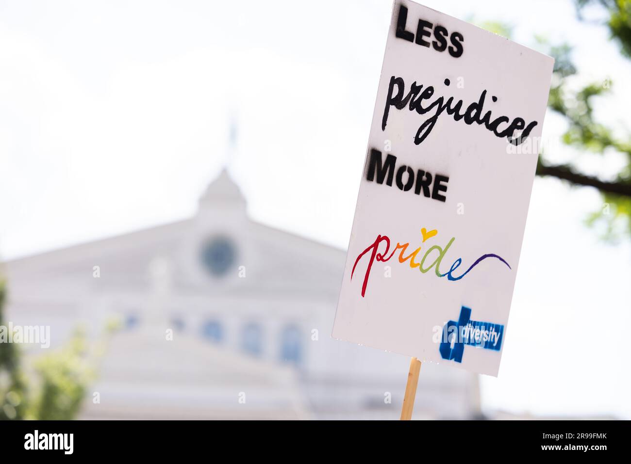 Munich, GERMANY - June 24, 2023: Poster 'Less prejudice more pride - diversity' at the Parade at Christopher Street  Day CSD in Munich. Stock Photo