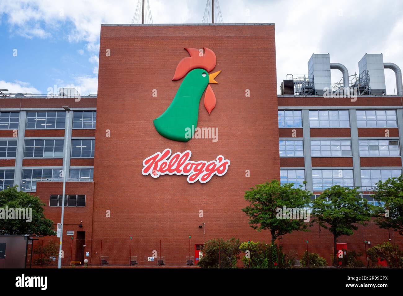 Kelloggs cereal production factory in Trafford Park with large Rooster logo on side of building