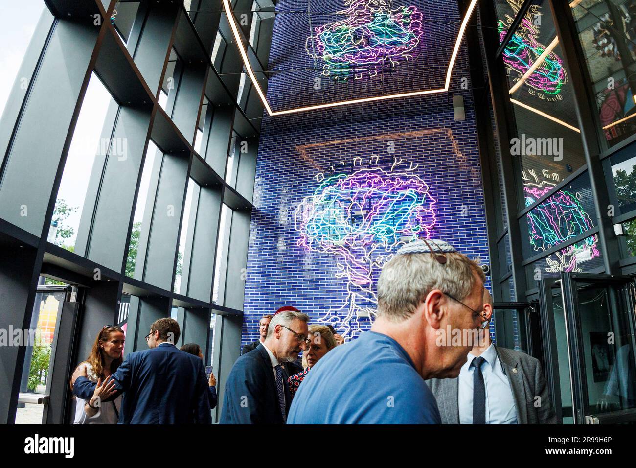 Berlin, Germany. 25th June, 2023. Visitors stand inside the building
