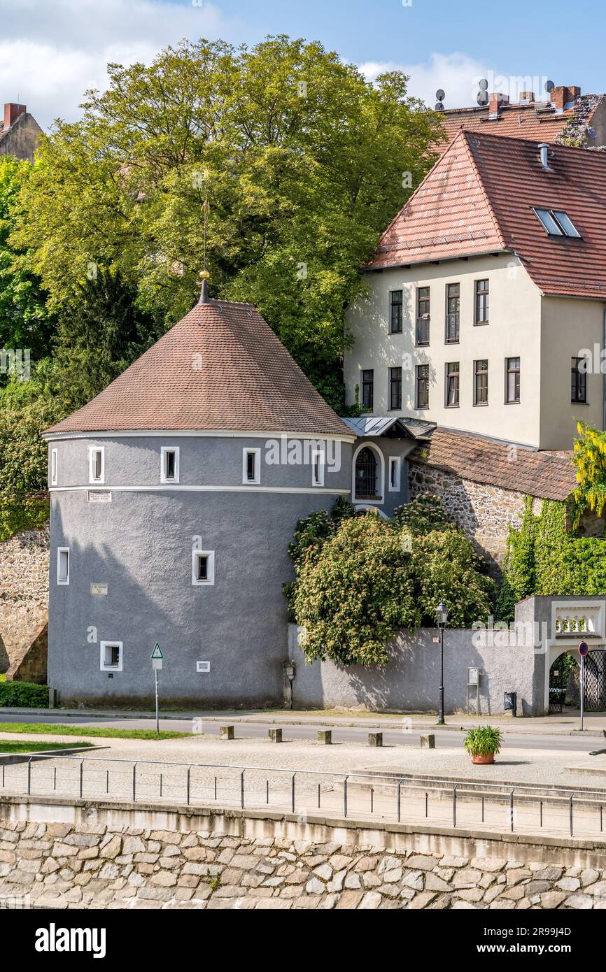 Circular gun tower bastion turned into living quarter near the Neisse river in Gorlitz Germany, on the border with Poland Stock Photo