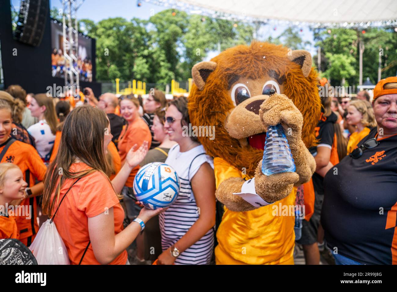 ZEIST The mascot of the Orange Women cools fans with a plant spray