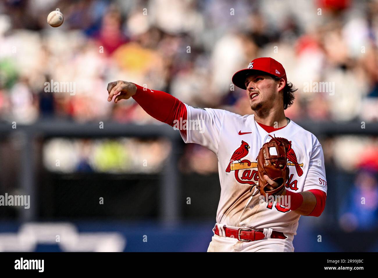 Nolan Gorman 16 of the St. Louis Cardinals throws the ball to first