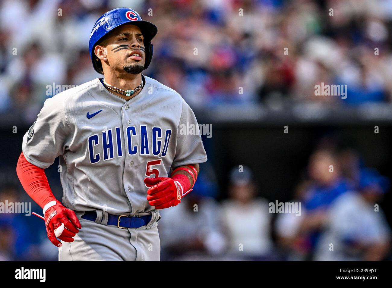 Christopher Morel 5 of the Chicago Cubs runs for first base during the