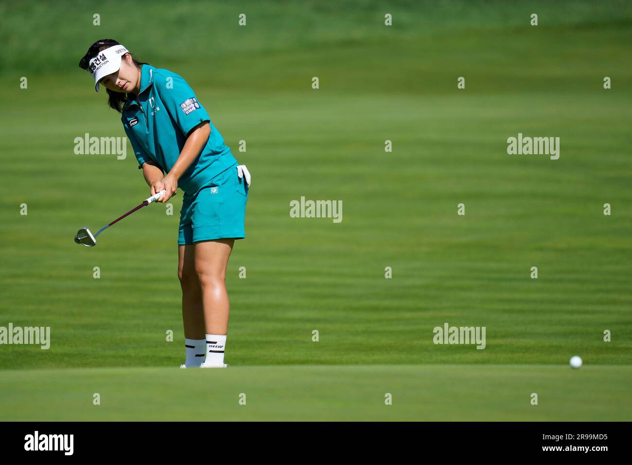 Lee Jeong-eun, of South Korea, putts on the first hole during the final ...