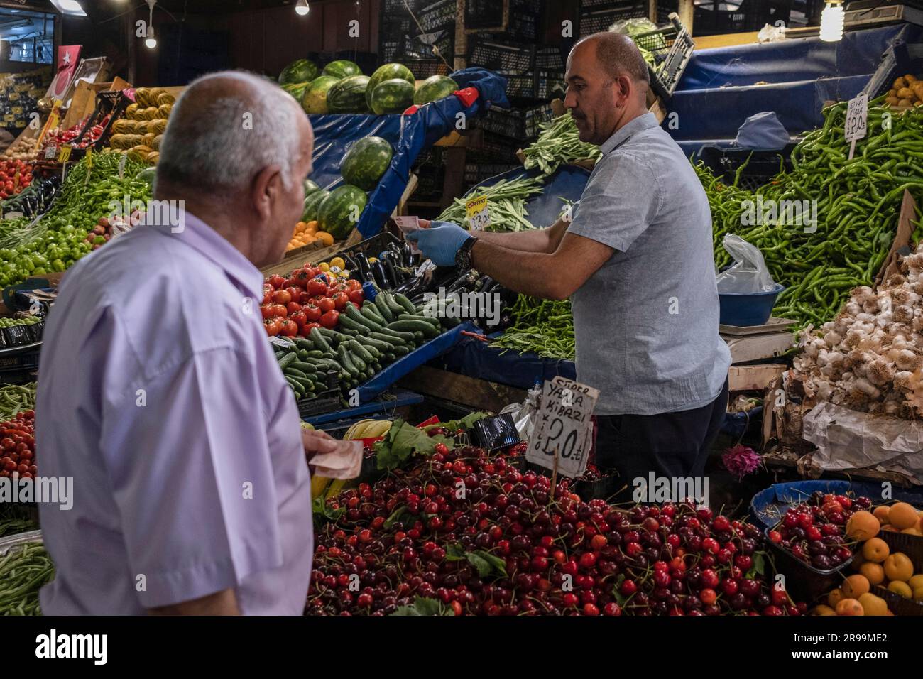 Ankara, Turkey. 24th June, 2023. A man is shopping for vegetables and  fruits at the Ulus Market. The rise of the dollar continues rapidly in  Turkey, the Turkish Lira continues to lose