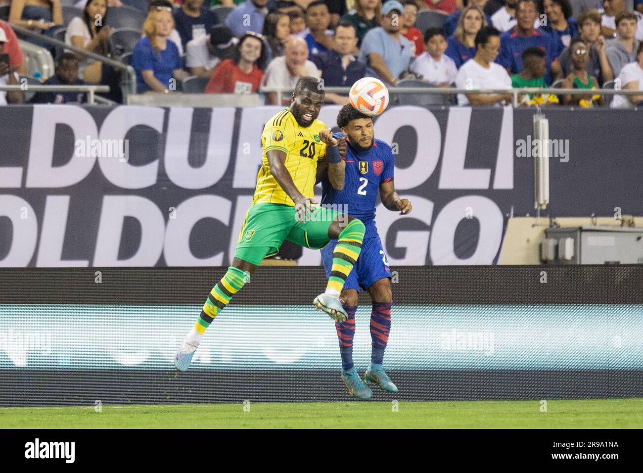 Chicago, USA. 24th June, 2023. Chicago, USA, June 24, 2023: Kemar Lawrence (20 Jamaica) and Deandre Yedlin (2 U.S. Men's National Soccer Team) jumps for a header during the CONCACAF Gold Cup football match between the U.S. Men's National Soccer Team and Jamaica on Saturday June 24 at Soldier Field, Chicago, USA. (NO COMMERCIAL USAGE). (Shaina Benhiyoun/SPP) Credit: SPP Sport Press Photo. /Alamy Live News Stock Photo