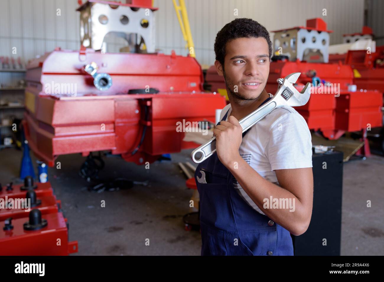 male mechanic engineer holding tools Stock Photo