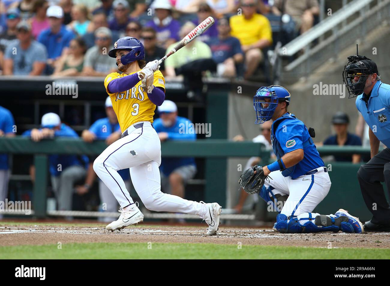 LSU outfielder Dylan Crews (3) singles during the first inning of Game