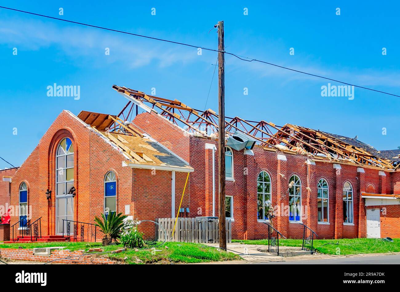 First Missionary Baptist Church stands amid tornado damage, June 24