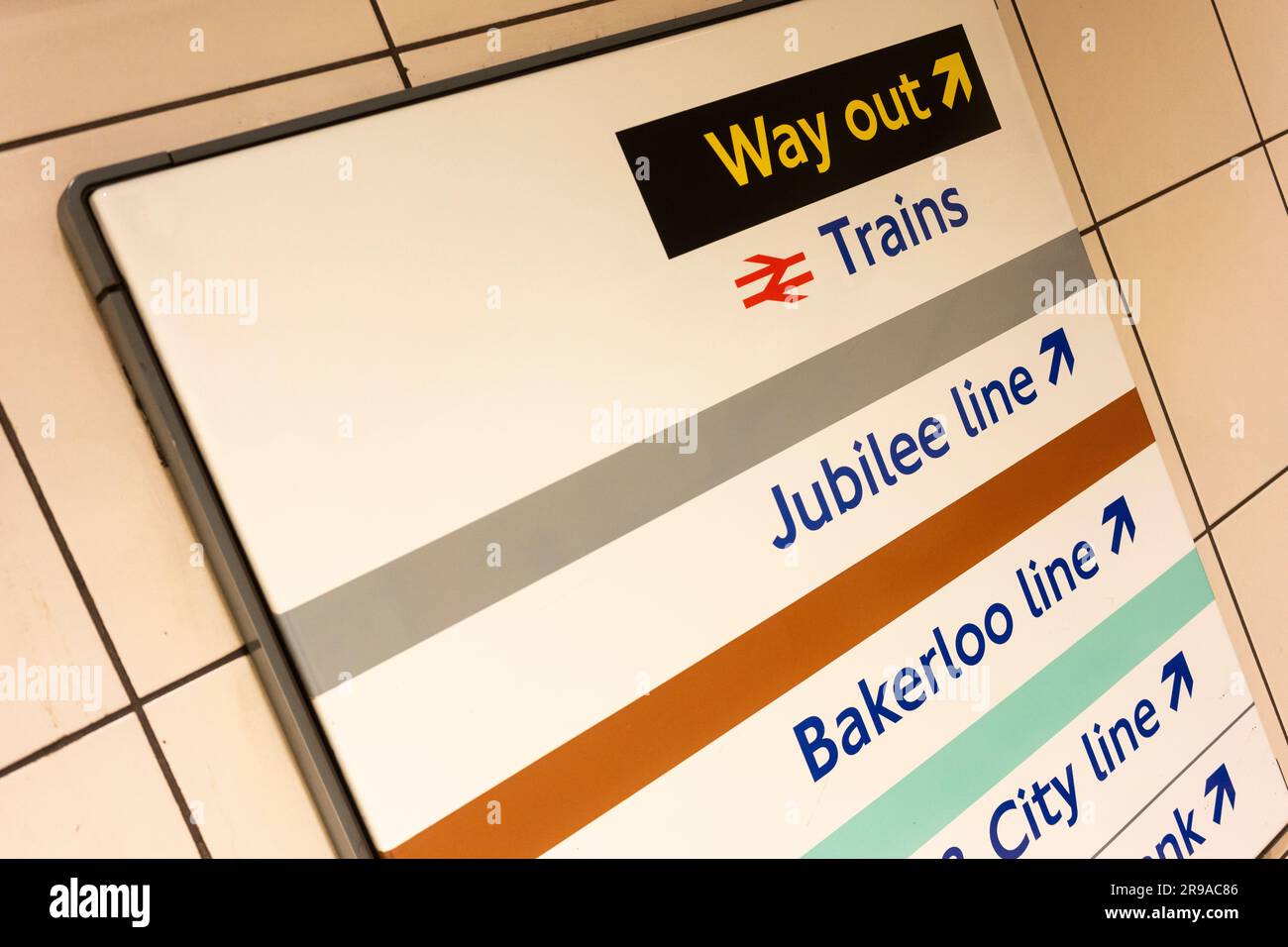 Directions sign on the London Underground showing the Way Out, Jubilee Line, Bakerloo Line, Waterloo and City Line and South Bank tube lines. UK Stock Photo