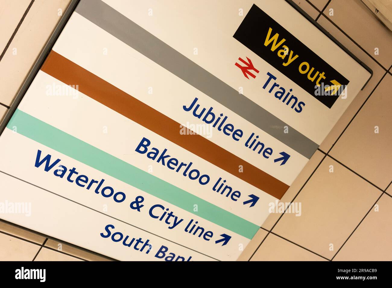 Directions sign on the London Underground showing the Way Out, Jubilee Line, Bakerloo Line, Waterloo and City Line and South Bank tube lines. UK Stock Photo