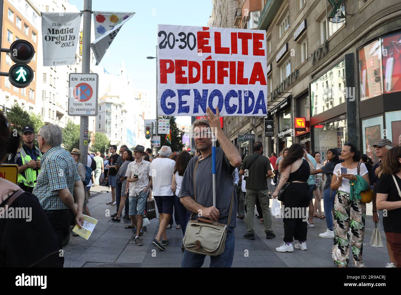 Madrid, Spain. 24th June, 2023. A protester with a placard marches during the demonstration. Denialist demonstration called 'STOP Agenda 2030' held in Madrid on Saturday, June 24. The demonstration toured the center of Madrid from Plaza España to the doors of the Ministry of Social Rights and the 2030 Agenda. Credit: SOPA Images Limited/Alamy Live News Stock Photo