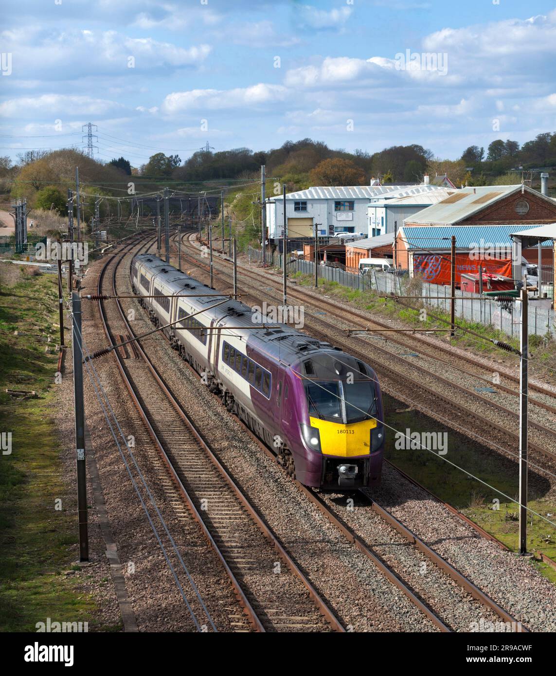 East Midlands railway class 180 diesel train on the electrified 4 track Midland Mainline passing Ampthill, Bedfordshire Stock Photo