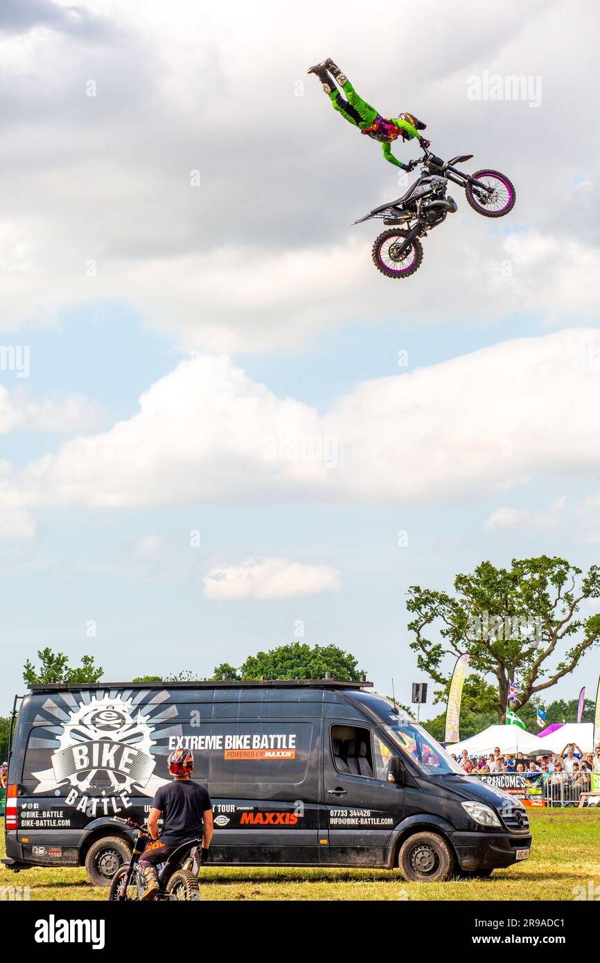 Motorcycle stunt rider from the extreme bike battle display team doing stunt jumps at the royal Cheshire show of 2023 Stock Photo