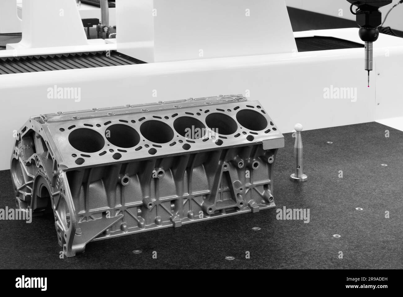 Coordinate measuring machine probe measure cylinder block of diesel engine repair. cylinder