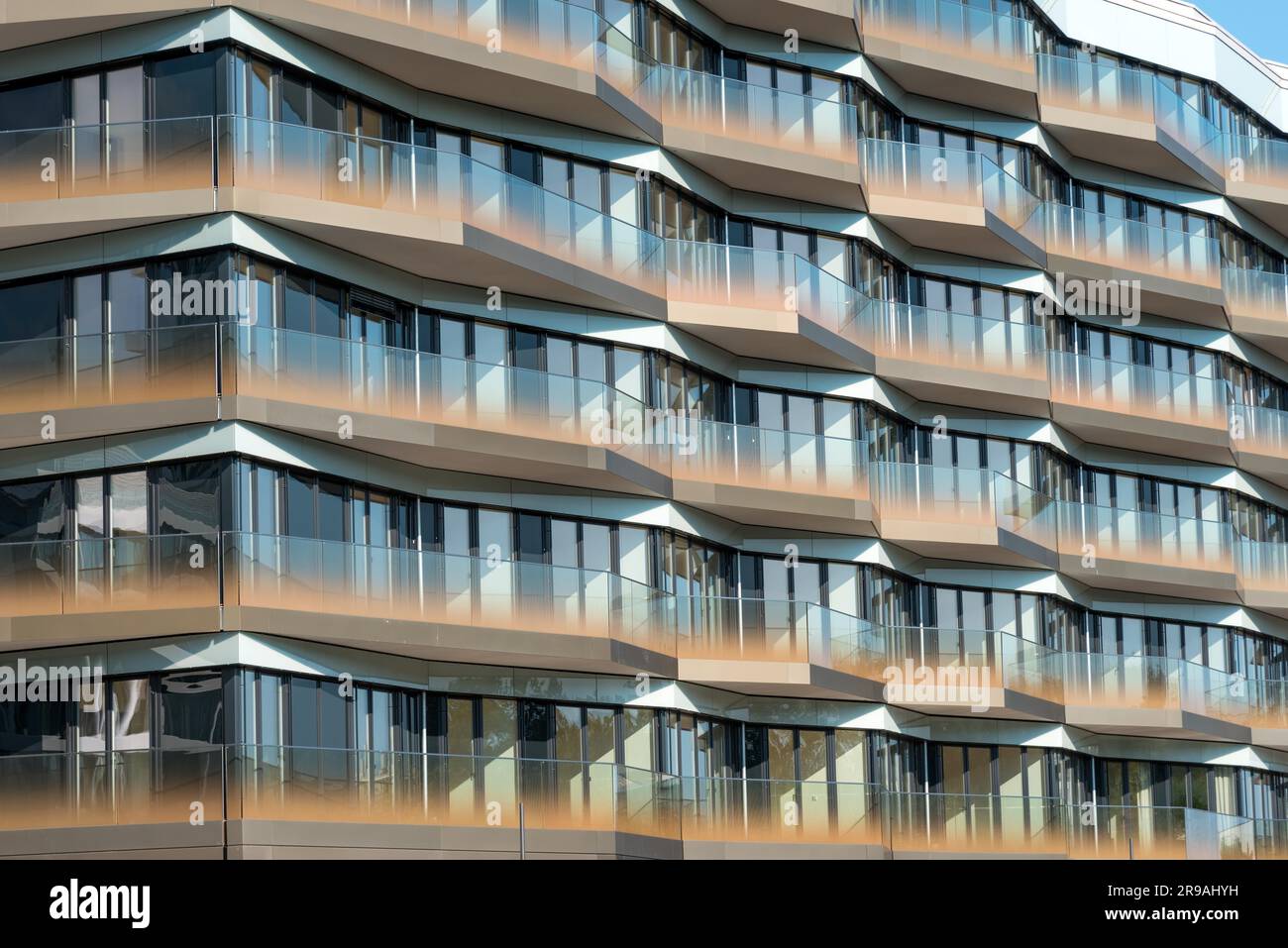 Detail of a modern apartment building with glazed balconies in Berlin ...