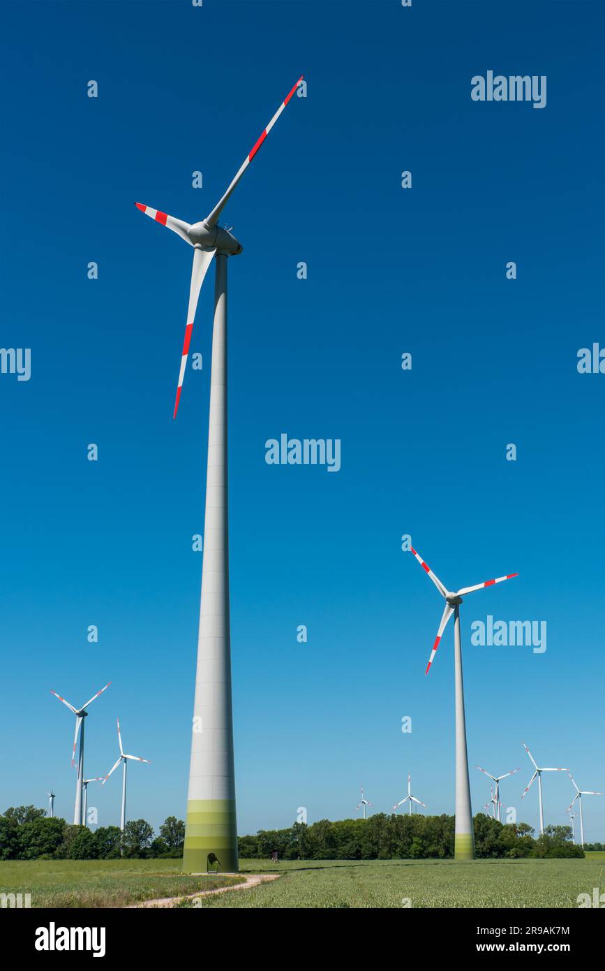 Wind turbines against a blue sky seen in Germany Stock Photo - Alamy