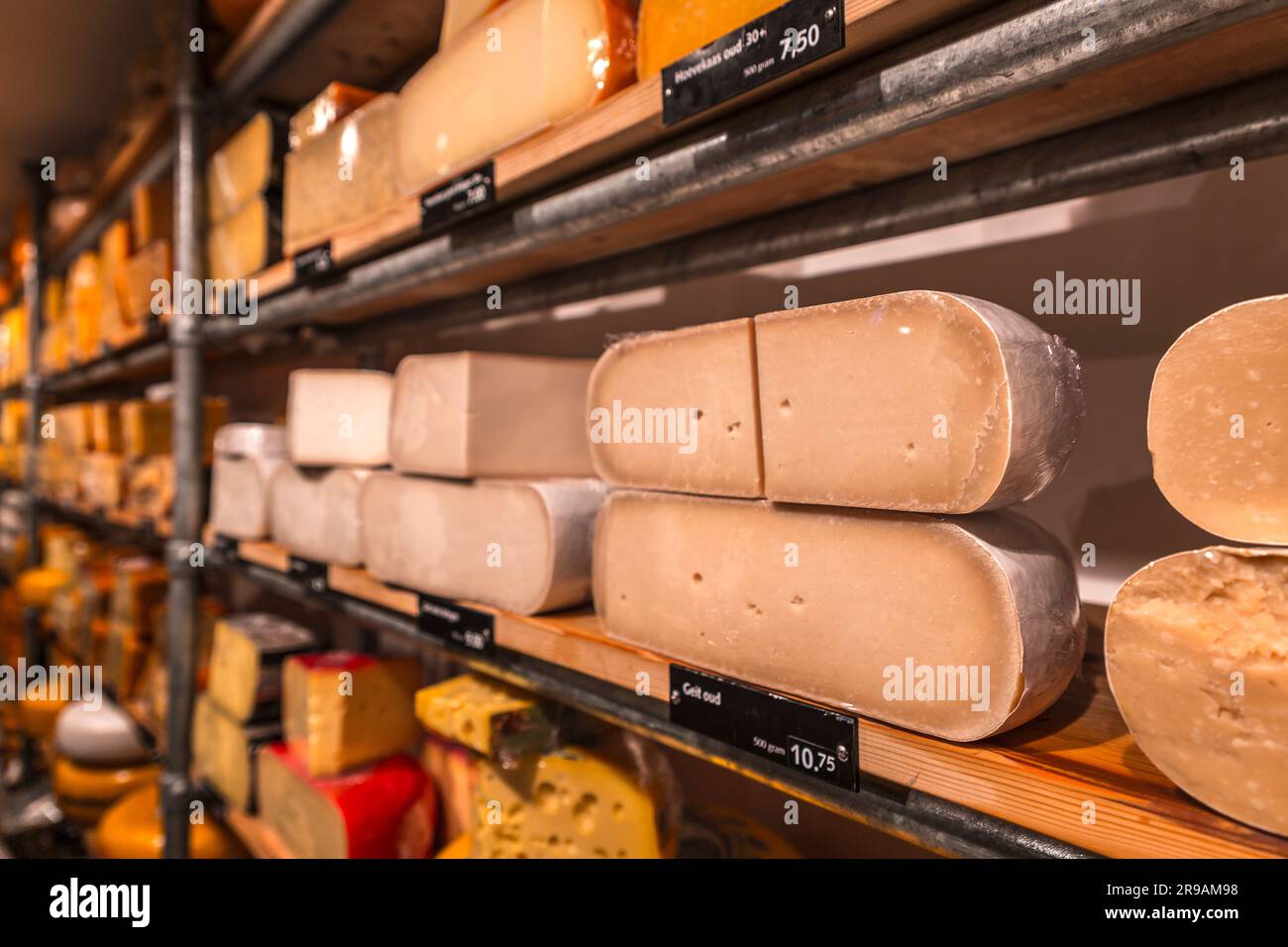 Utrecht, Netherlands - October 9, 2021: Different types of traditional Dutch cheese on sale at a cheese store in Utrecht, Netherlands. Stock Photo