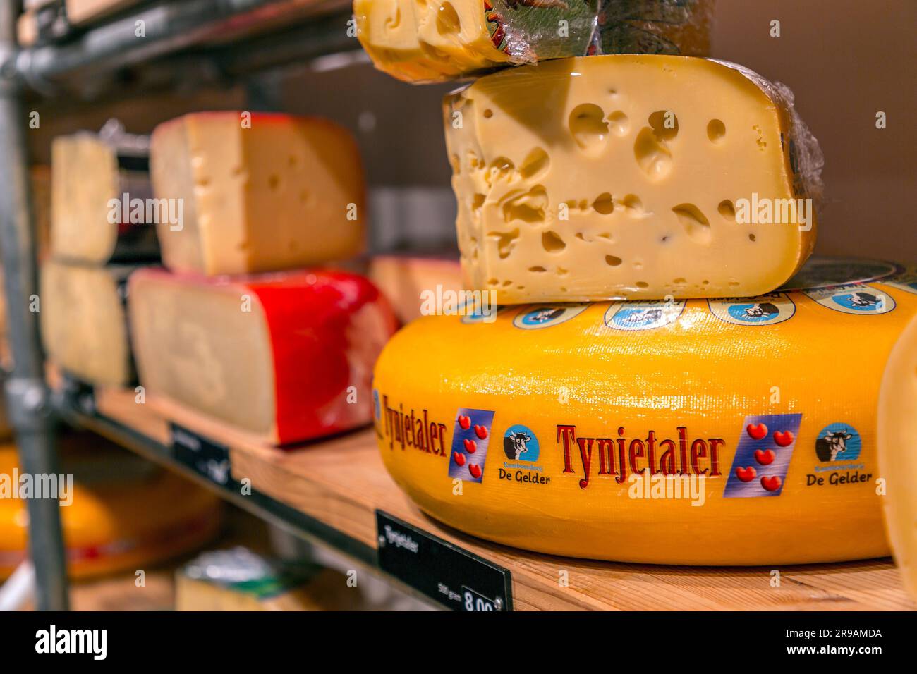 Utrecht, Netherlands - October 9, 2021: Different types of traditional Dutch cheese on sale at a cheese store in Utrecht, Netherlands. Stock Photo