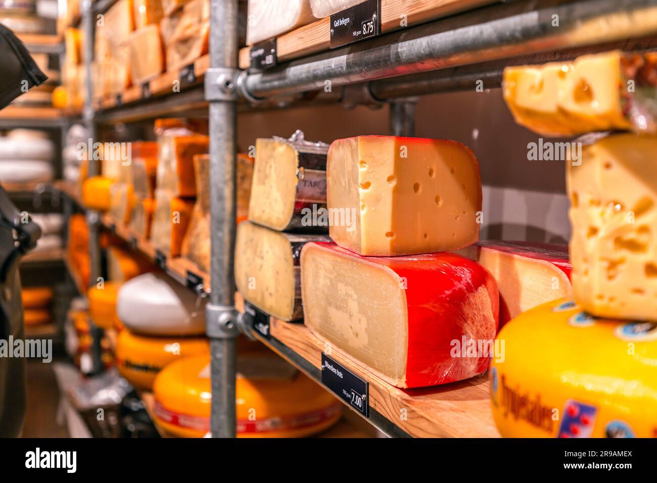 Utrecht, Netherlands - October 9, 2021: Different types of traditional Dutch cheese on sale at a cheese store in Utrecht, Netherlands. Stock Photo